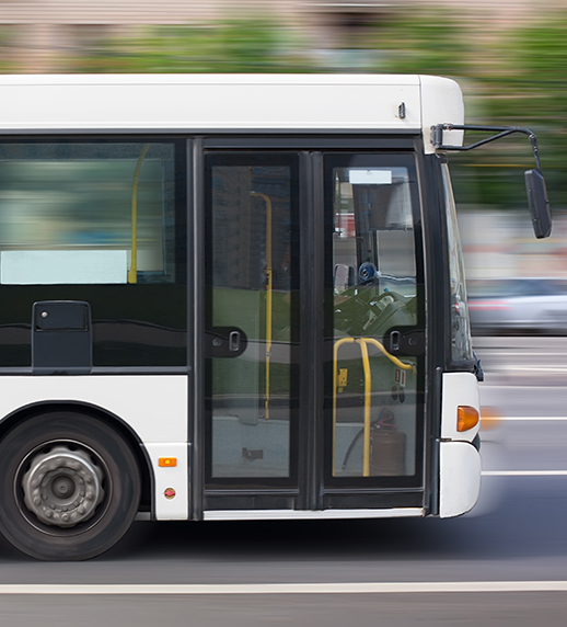 Image of a transit bus driving.